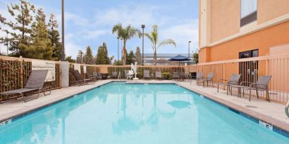 Refreshing outdoor pool at Hampton Inn & Suites Clovis.