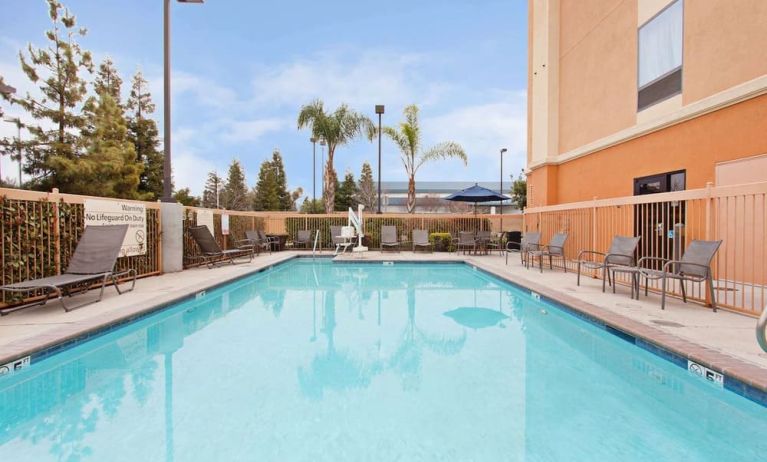 Refreshing outdoor pool at Hampton Inn & Suites Clovis.