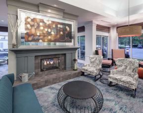 Lobby and coworking lounge at Hilton Garden Inn Sacramento/South Natomas.