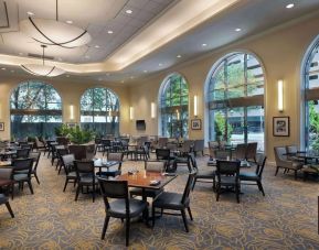 Dining area perfect for coworking at Hilton Indianapolis Hotel & Suites.