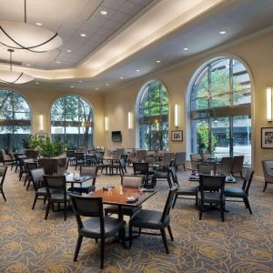 Dining area perfect for coworking at Hilton Indianapolis Hotel & Suites.