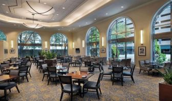 Dining area perfect for coworking at Hilton Indianapolis Hotel & Suites.