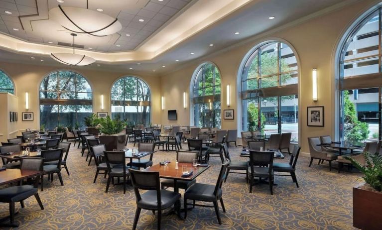 Dining area perfect for coworking at Hilton Indianapolis Hotel & Suites.