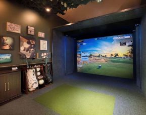 Indoor golf driving range at Hilton Indianapolis Hotel & Suites.