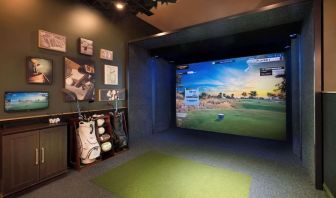 Indoor golf driving range at Hilton Indianapolis Hotel & Suites.