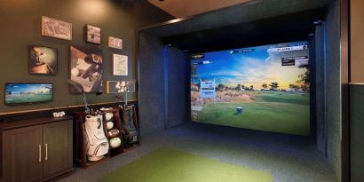 Indoor golf driving range at Hilton Indianapolis Hotel & Suites.