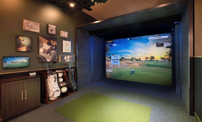 Indoor golf driving range at Hilton Indianapolis Hotel & Suites.