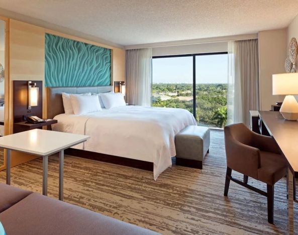 Day use room with work desk and sofa at Marriott Boca Raton.