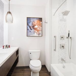 Guest bathroom with shower and tub at Marriott Del Mar.