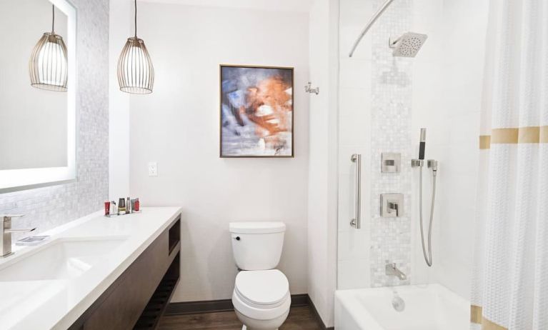 Guest bathroom with shower and tub at Marriott Del Mar.