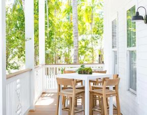 Bar chairs and tables at Parrot Key Hotel & Villas.