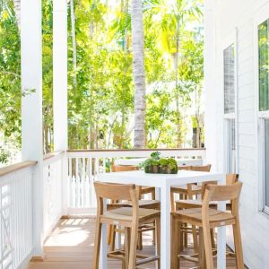 Bar chairs and tables at Parrot Key Hotel & Villas.