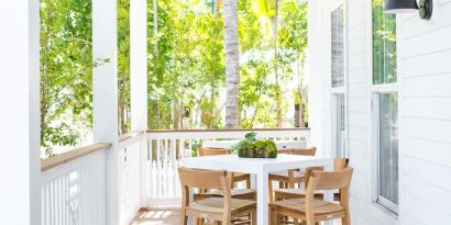 Bar chairs and tables at Parrot Key Hotel & Villas.