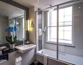 Private guest bathroom with free toiletries at The Wellington by Blue Orchid Hotel (FKA The Rochester).