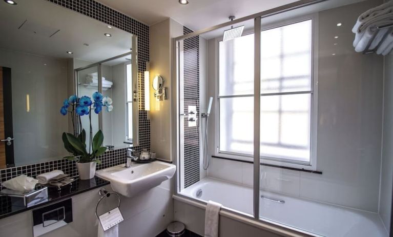 Private guest bathroom with free toiletries at The Wellington by Blue Orchid Hotel (FKA The Rochester).