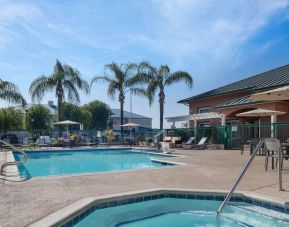 Refreshing outdoor pool and spa tub at Residence Inn Santa Clarita.