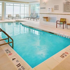 Refreshing indoor pool at Springhill Suites Carle Place.