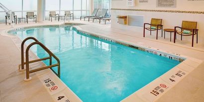 Refreshing indoor pool at Springhill Suites Carle Place.