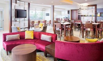 Lobby and coworking lounge at Springhill Suites Carle Place.