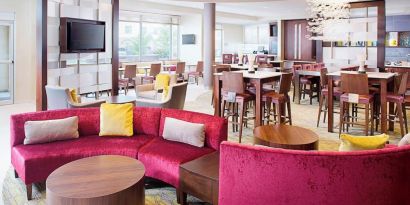 Lobby and coworking lounge at Springhill Suites Carle Place.