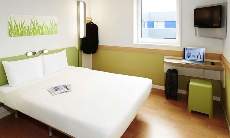 Bright and spacious day use room with work desk at Hotel IBIS Budget Birmingham Airport.