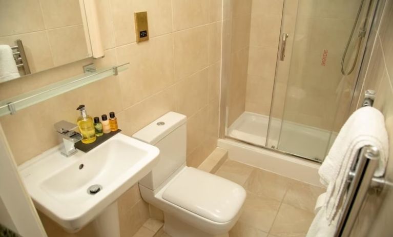 Guest bathroom with shower and free toiletries at The Ladbrooke Hotel.