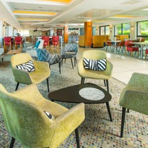 Comfortable lobby lounge at ibis Styles Birmingham NEC.