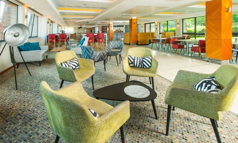 Comfortable lobby lounge at ibis Styles Birmingham NEC.