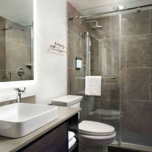 Guest bathroom with shower at Union Station Hotel Nashville.