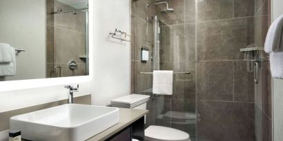 Guest bathroom with shower at Union Station Hotel Nashville.