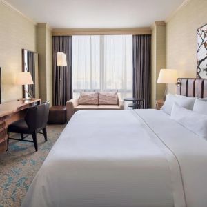 Day use room with sofa and work desk at The Westin Crystal City Reagan National Airport.
