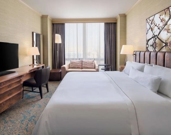 Day use room with sofa and work desk at The Westin Crystal City Reagan National Airport.
