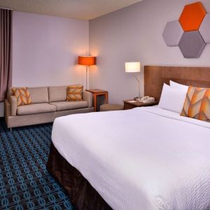 Day use room with sofa and work desk at Fairfield Inn By Marriott Las Vegas Convention Center.
