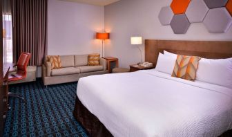 Day use room with sofa and work desk at Fairfield Inn By Marriott Las Vegas Convention Center.
