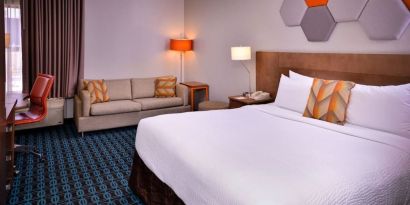 Day use room with sofa and work desk at Fairfield Inn By Marriott Las Vegas Convention Center.
