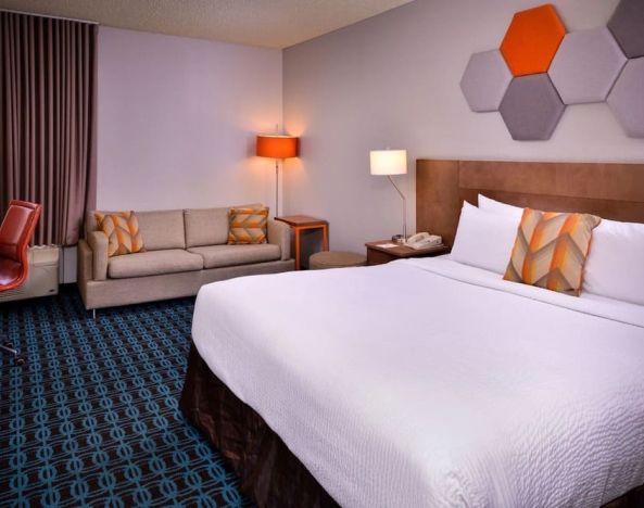 Day use room with sofa and work desk at Fairfield Inn By Marriott Las Vegas Convention Center.
