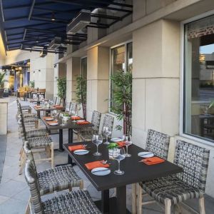 Alfresco dining area perfect for coworking at Hyatt Regency Valencia.