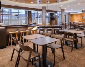 Dining area perfect for coworking at SpringHill Suites By Marriott Irvine John Wayne Airport/Orange County.