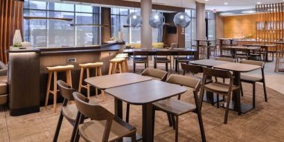 Dining area perfect for coworking at SpringHill Suites By Marriott Irvine John Wayne Airport/Orange County.