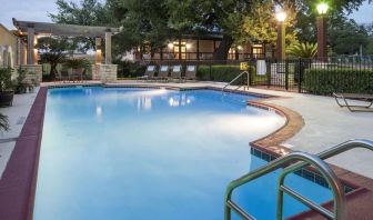 Refreshing outdoor pool at DoubleTree By Hilton Austin University Area.