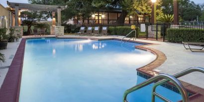 Refreshing outdoor pool at DoubleTree By Hilton Austin University Area.