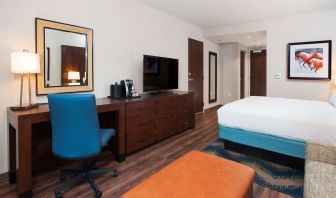 Day use room with work desk and sofa at Hilton Garden Inn Burbank Downtown.