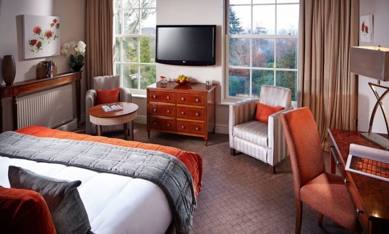 Day use king room with work desk and lounge seating at Alexander House Hotel And Utopia Spa Hotel.