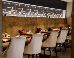 Dining area at Alexander House Hotel And Utopia Spa Hotel.