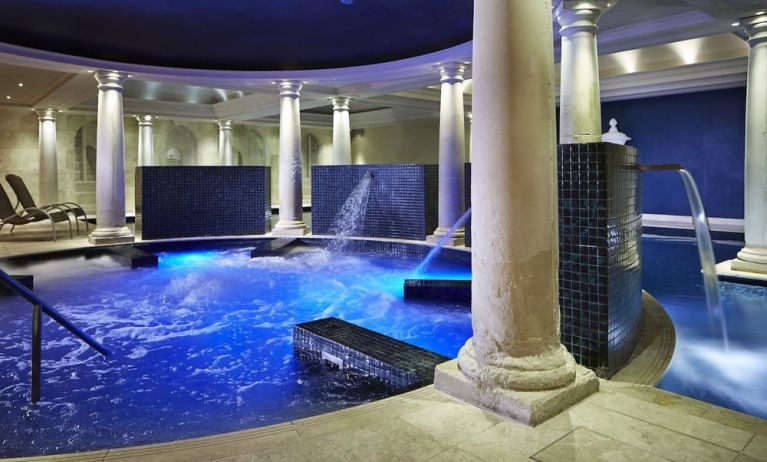 Indoor pool with jacuzzi at Alexander House Hotel And Utopia Spa Hotel.