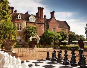 Outdoor terrace and patio at Alexander House Hotel And Utopia Spa Hotel.