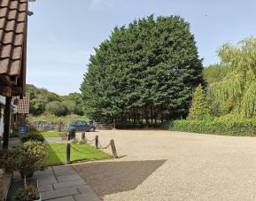 Outdoors and parking area at Little Foxes Hotel.