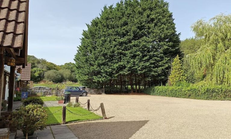 Outdoors and parking area at Little Foxes Hotel.