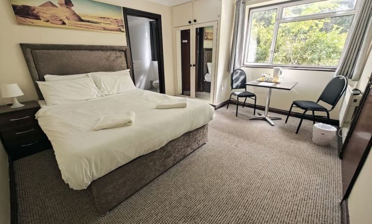 Bright and spacious day use room with lounge area at Little Foxes Hotel.