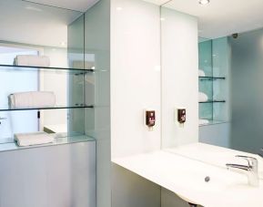 Private guest bathroom with free toiletries at Ibis Styles Crewe.